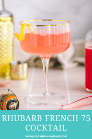 a rhubarb french 75 in a coupe glass with a lemon twist