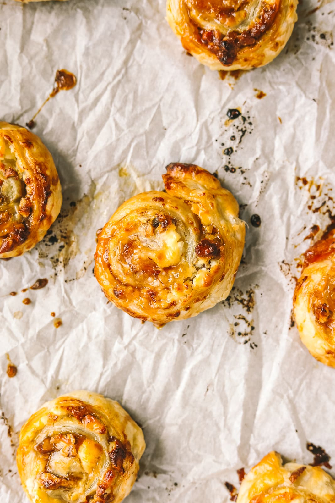 closeup of a goat cheese and apricot jam pinwheel