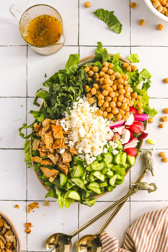 green summer chopped salad on a serving platter