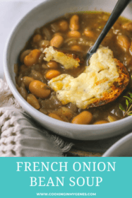 side view of french onion soup with spoon