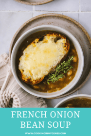 top view of cheesy toast on top of bean soup