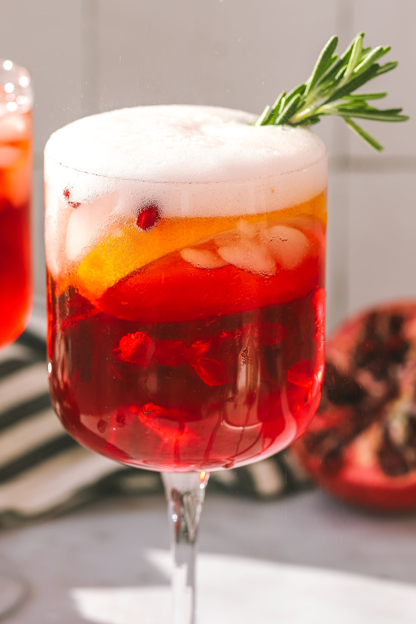 overflowing glass with spritz cocktail