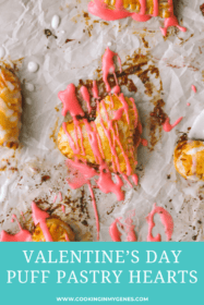 closeup of pink icing on a mini heart shaped pie
