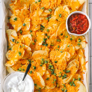 sheet pan of cheesy baked jalapeno ranch chips with dips
