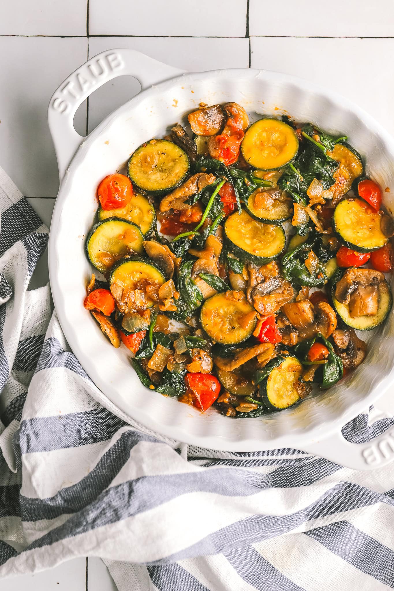 cooked vegetables in a pie plate