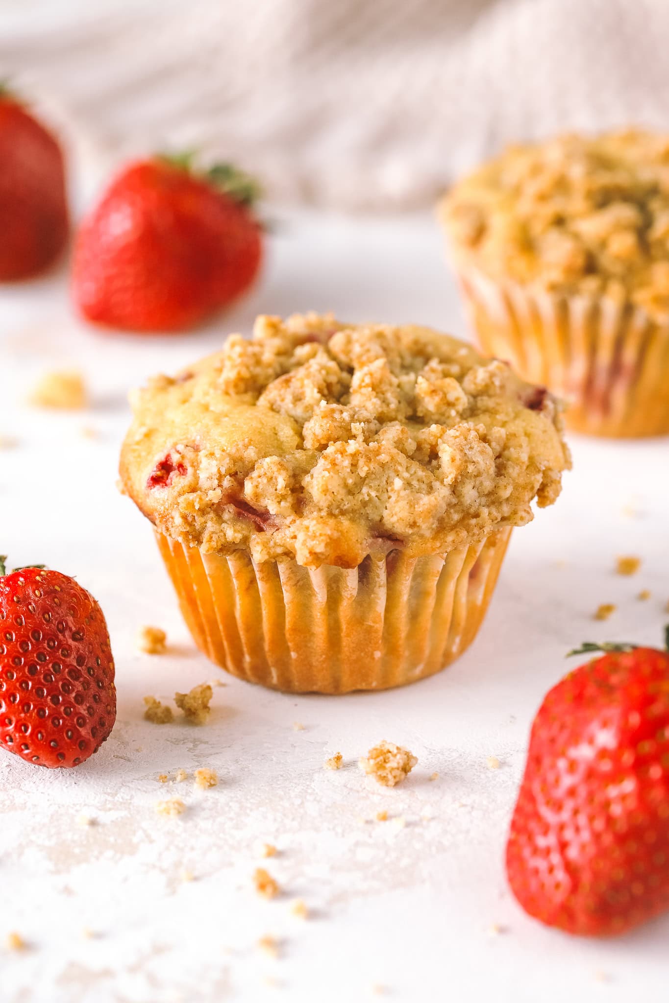 angled shot of strawberry rhubarb muffin