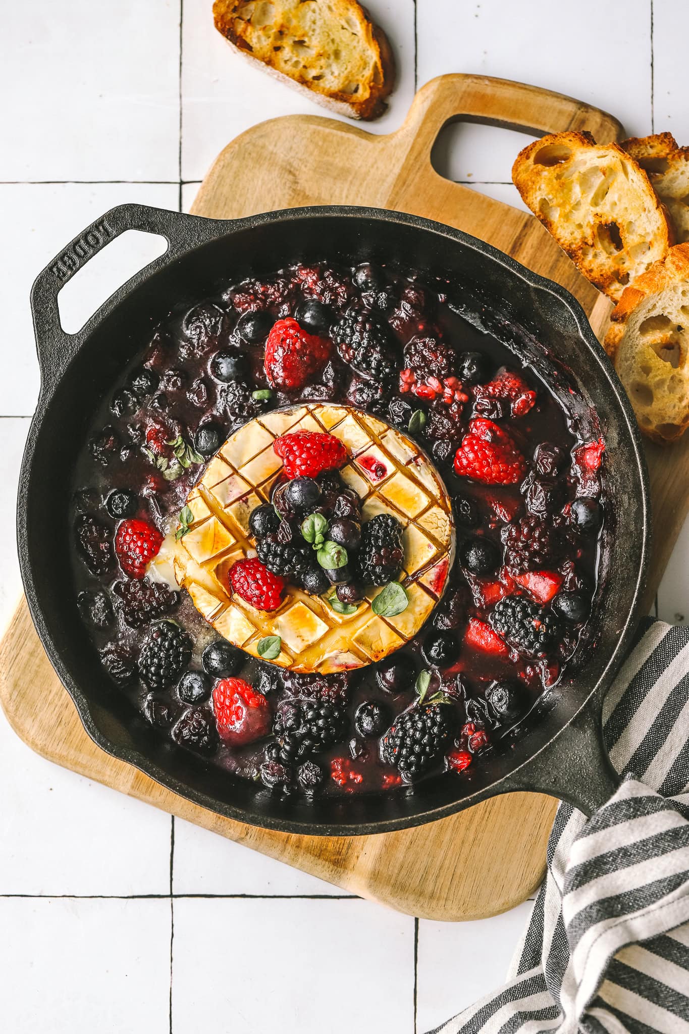 grilled brie in a cast iron pan