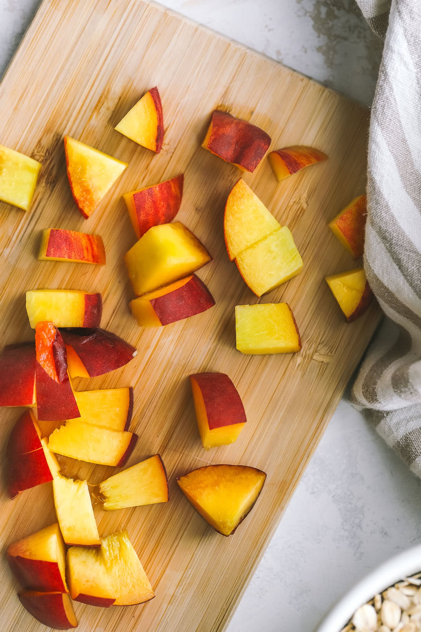 chopped peaches on a cutting board