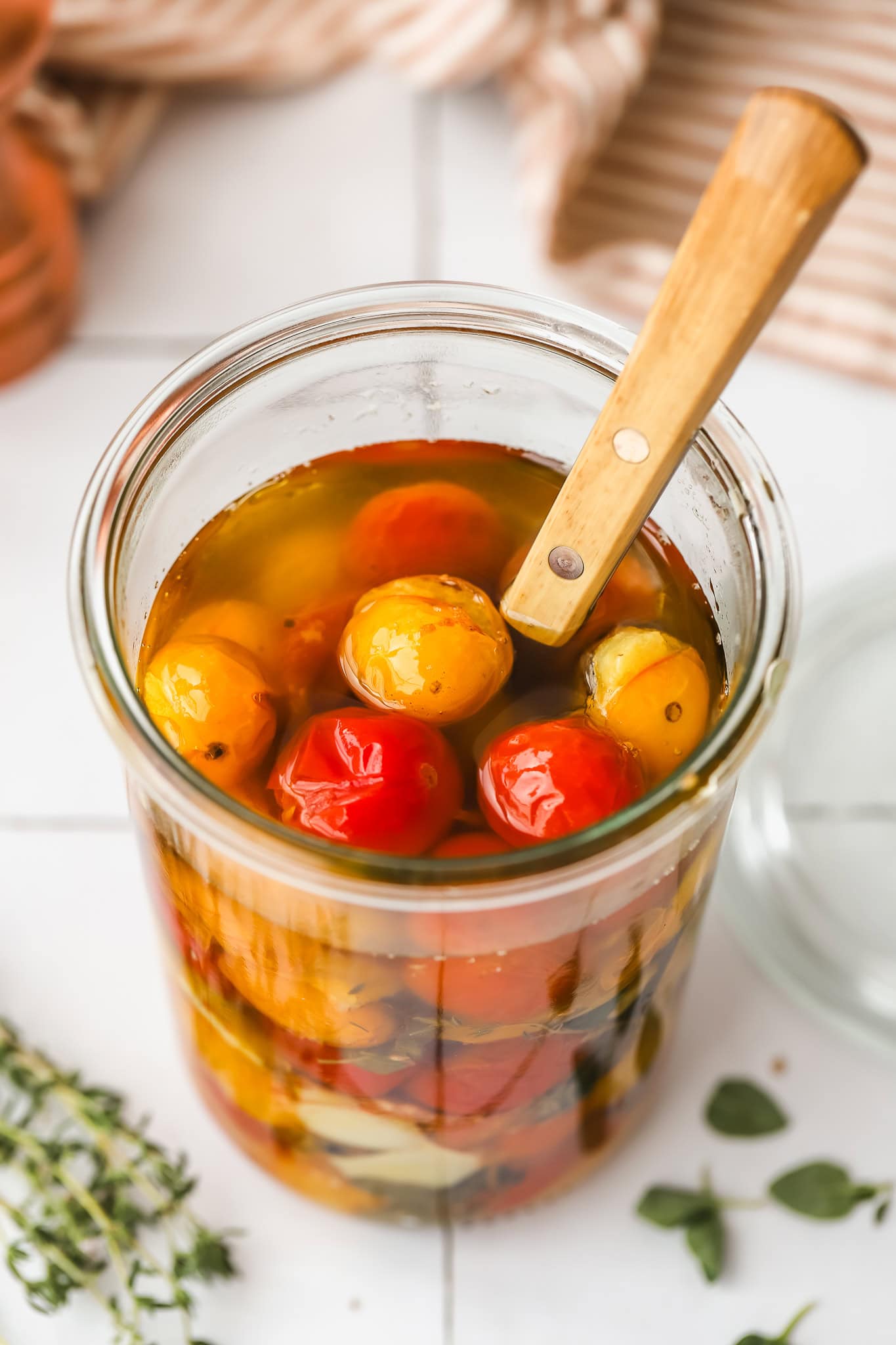 confit tomatoes in a jar angled shot