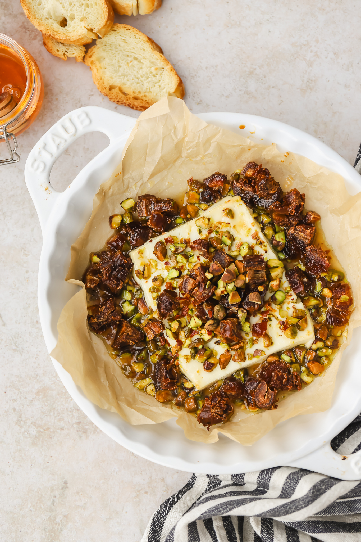 overhead of baked feta with dates