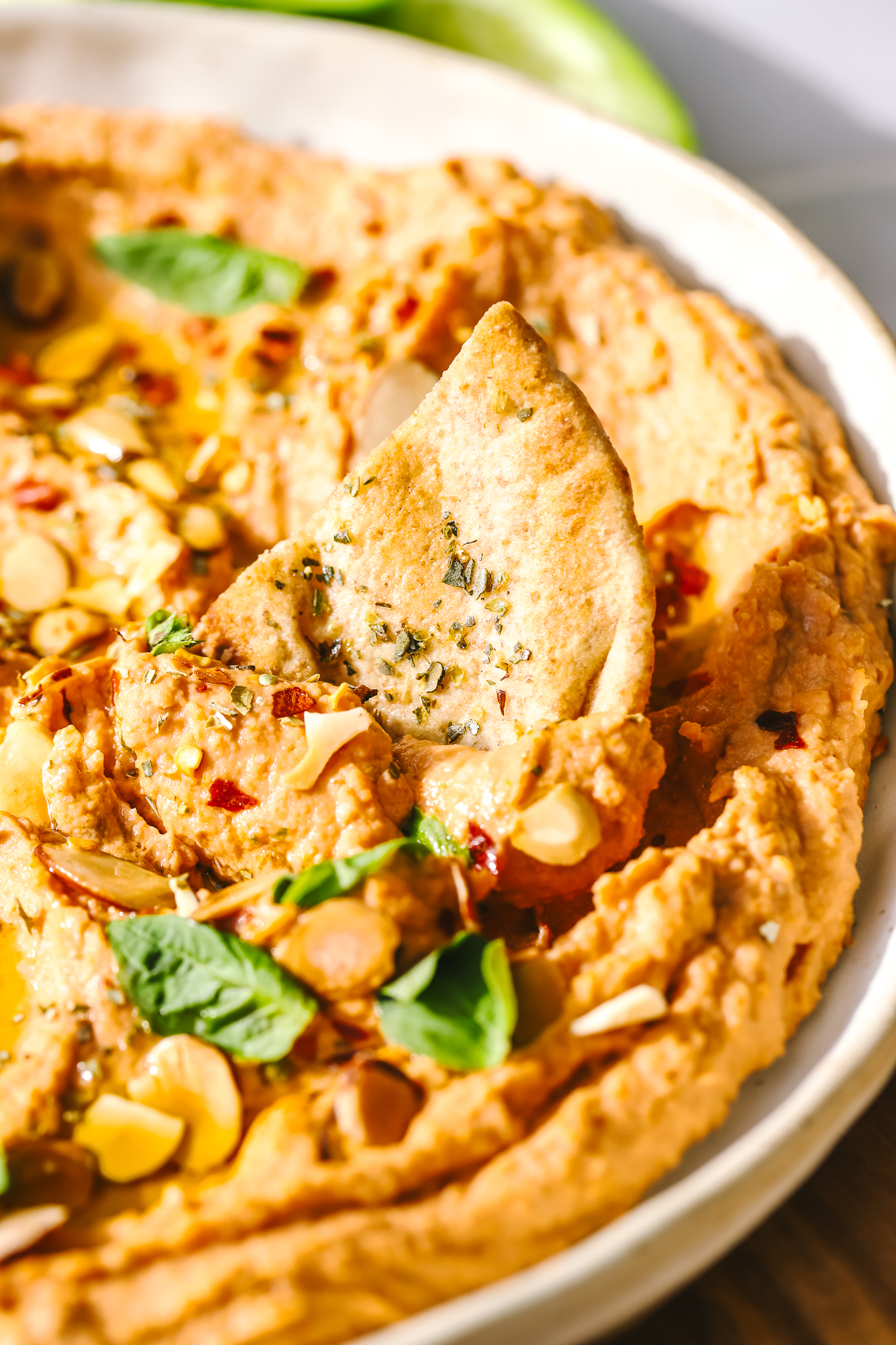 pita chip in white bean hummus