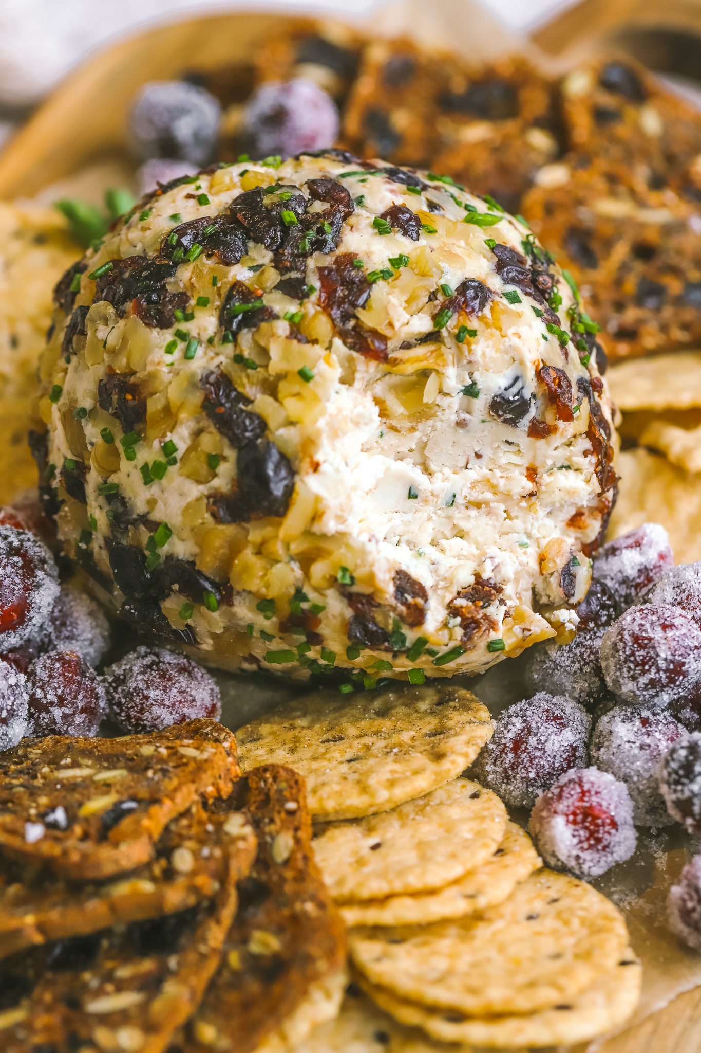 cheese ball with slices out of it