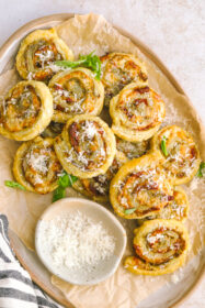 tray full of pesto pinwheels