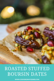 stuffed date on a serving tray with pistachios and pomegranate seeds