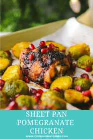 close up of chicken thighs with pomegranate seeds