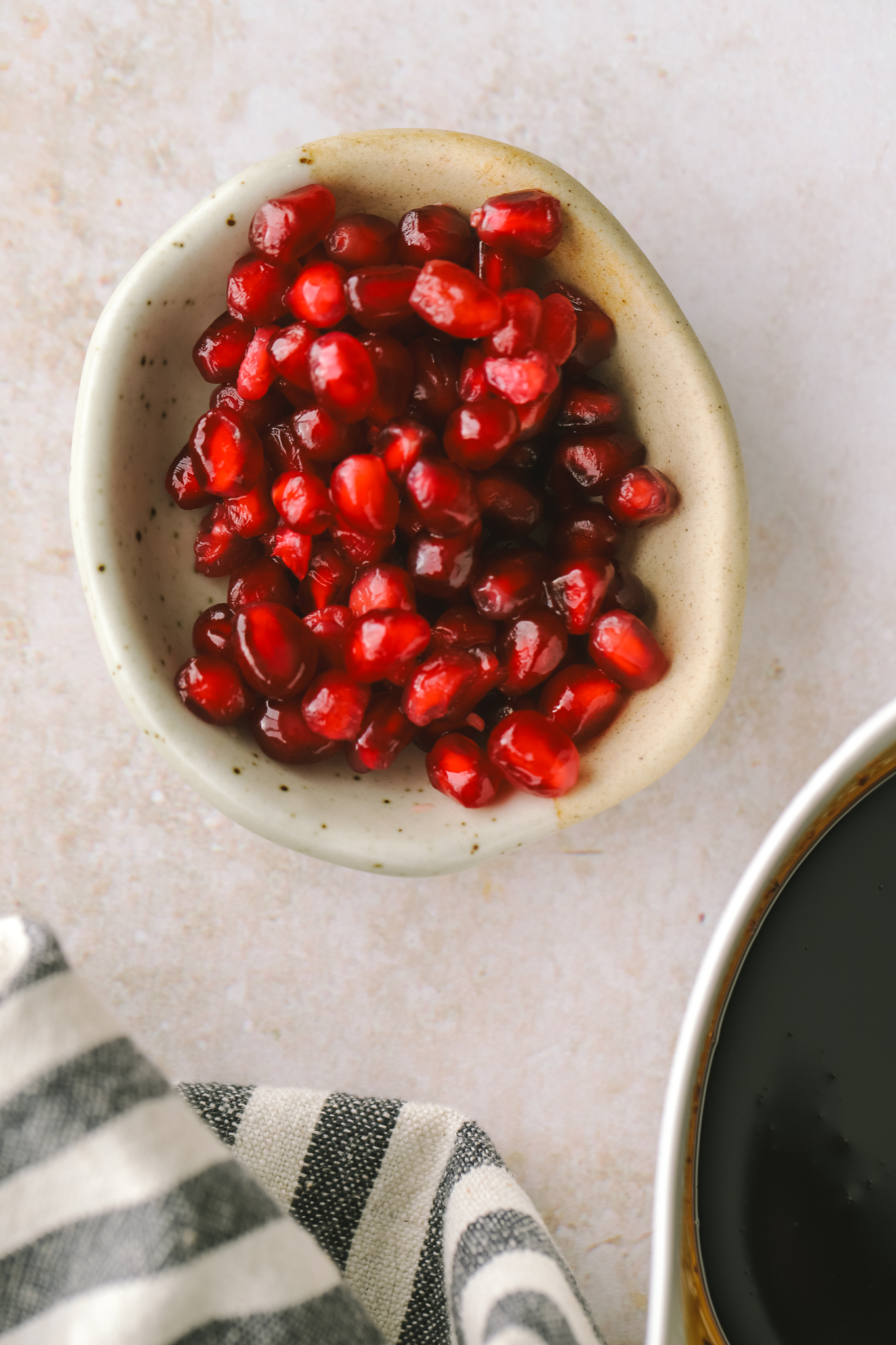 pomegranate seeds in a bowl