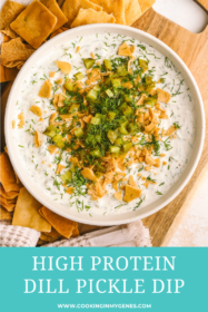 high protein dill pickle dip in a bowl served with pita chips