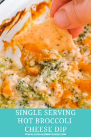 cracker dipped into broccoli cheese dip