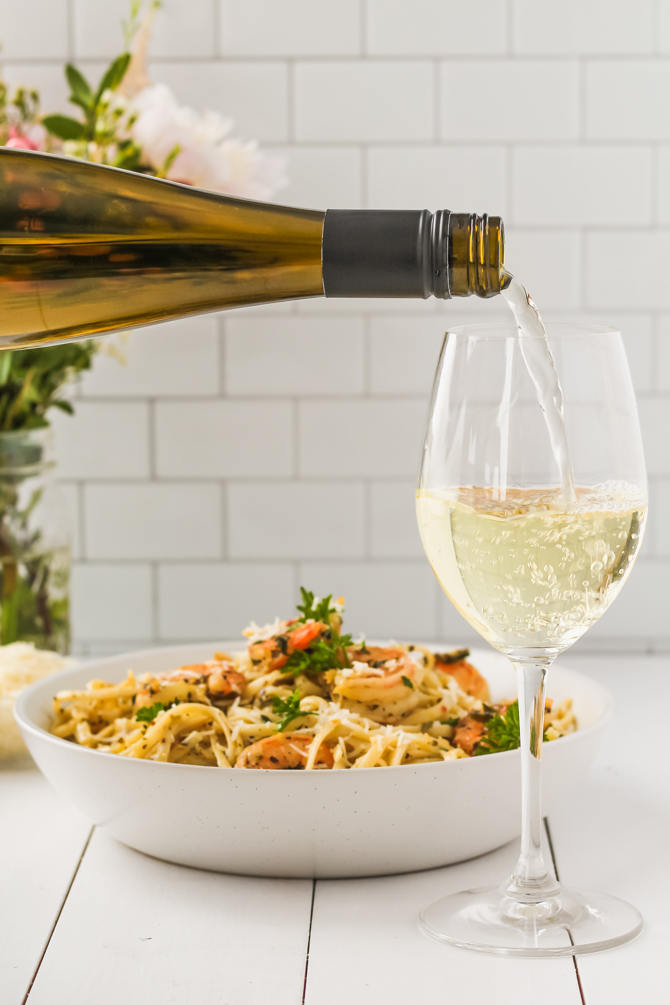 wine being poured into a glass