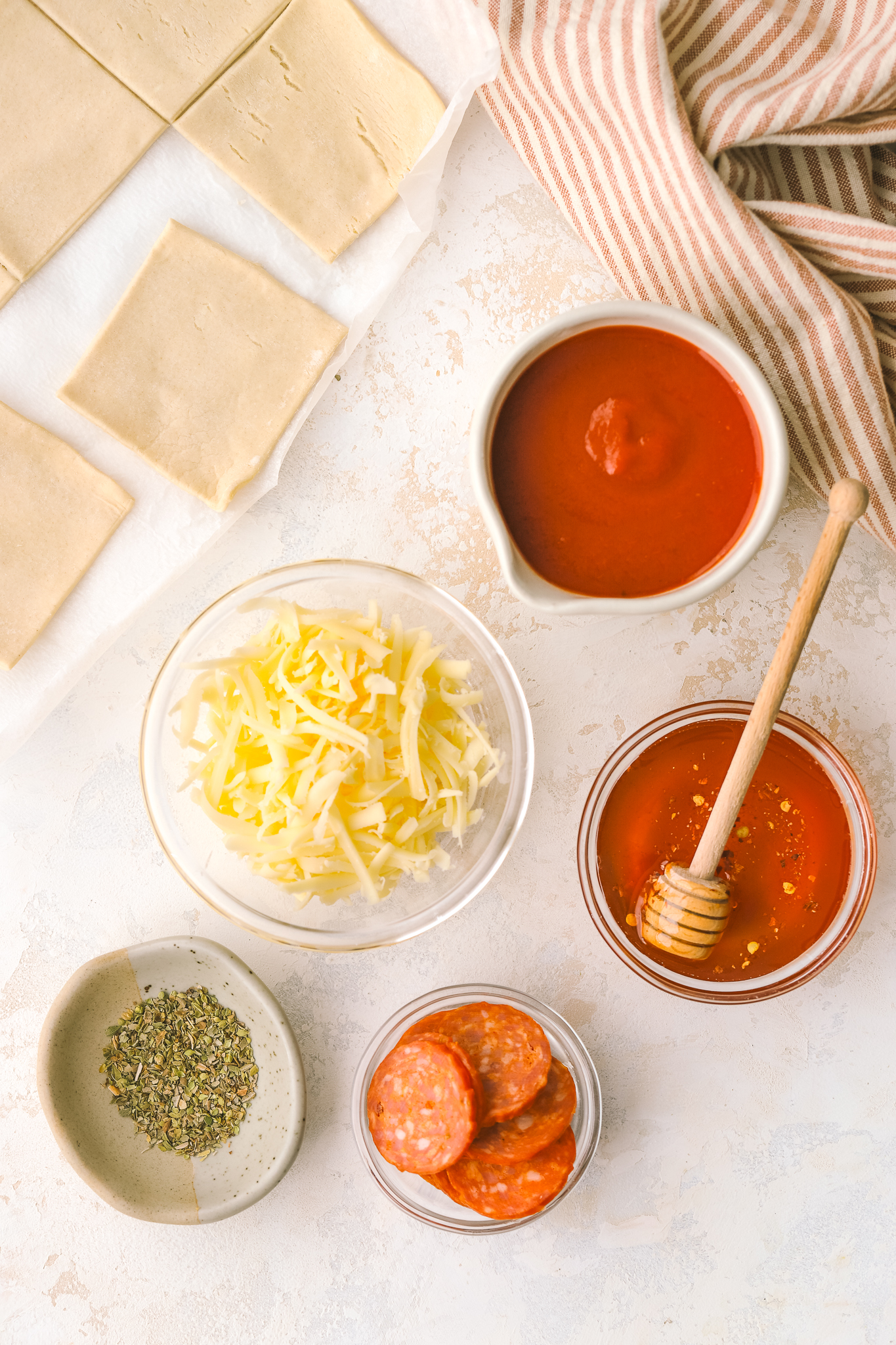 pizza tarts ingredients in bowls