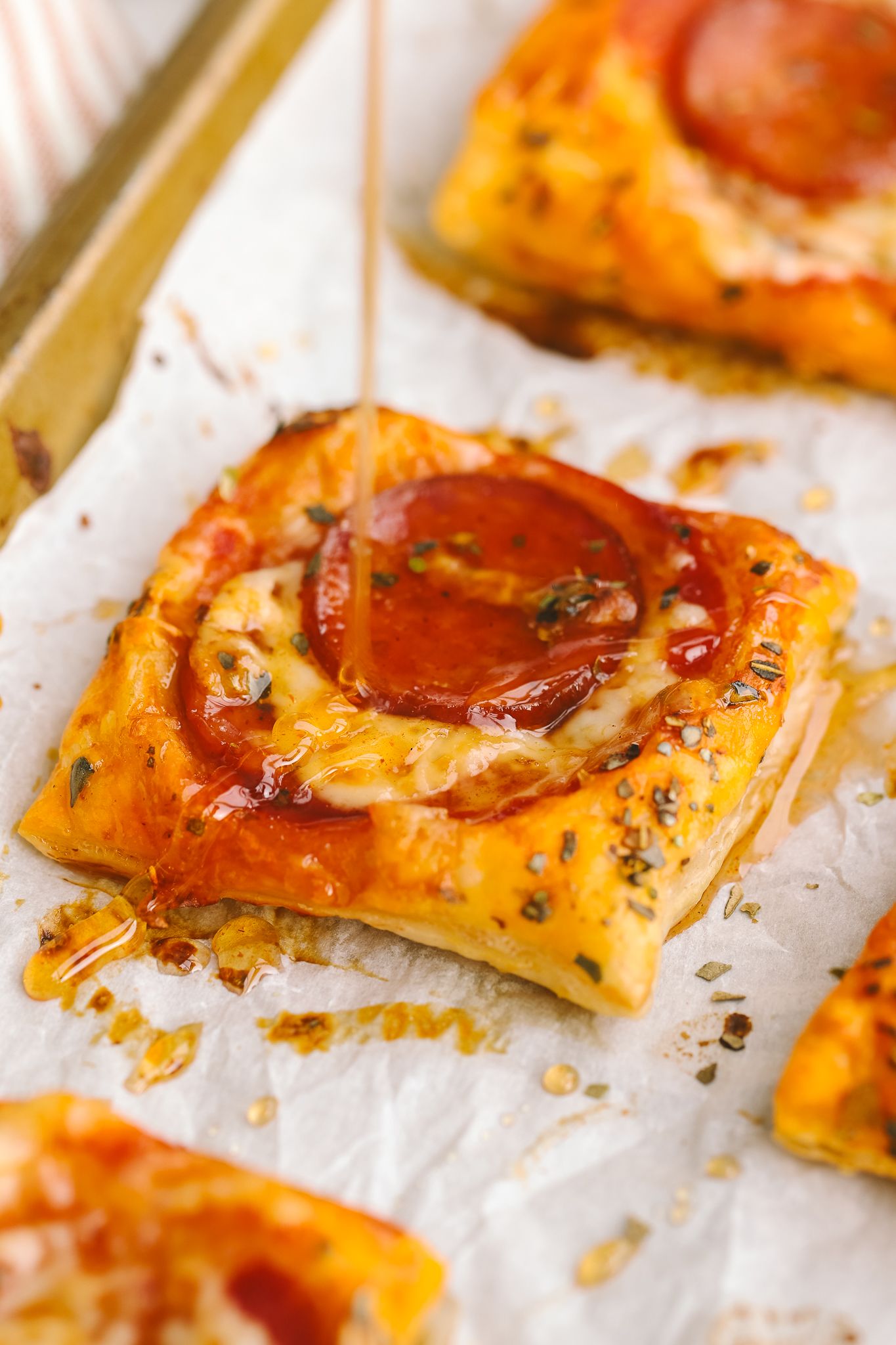 hot honey drizzled on a pizza tart