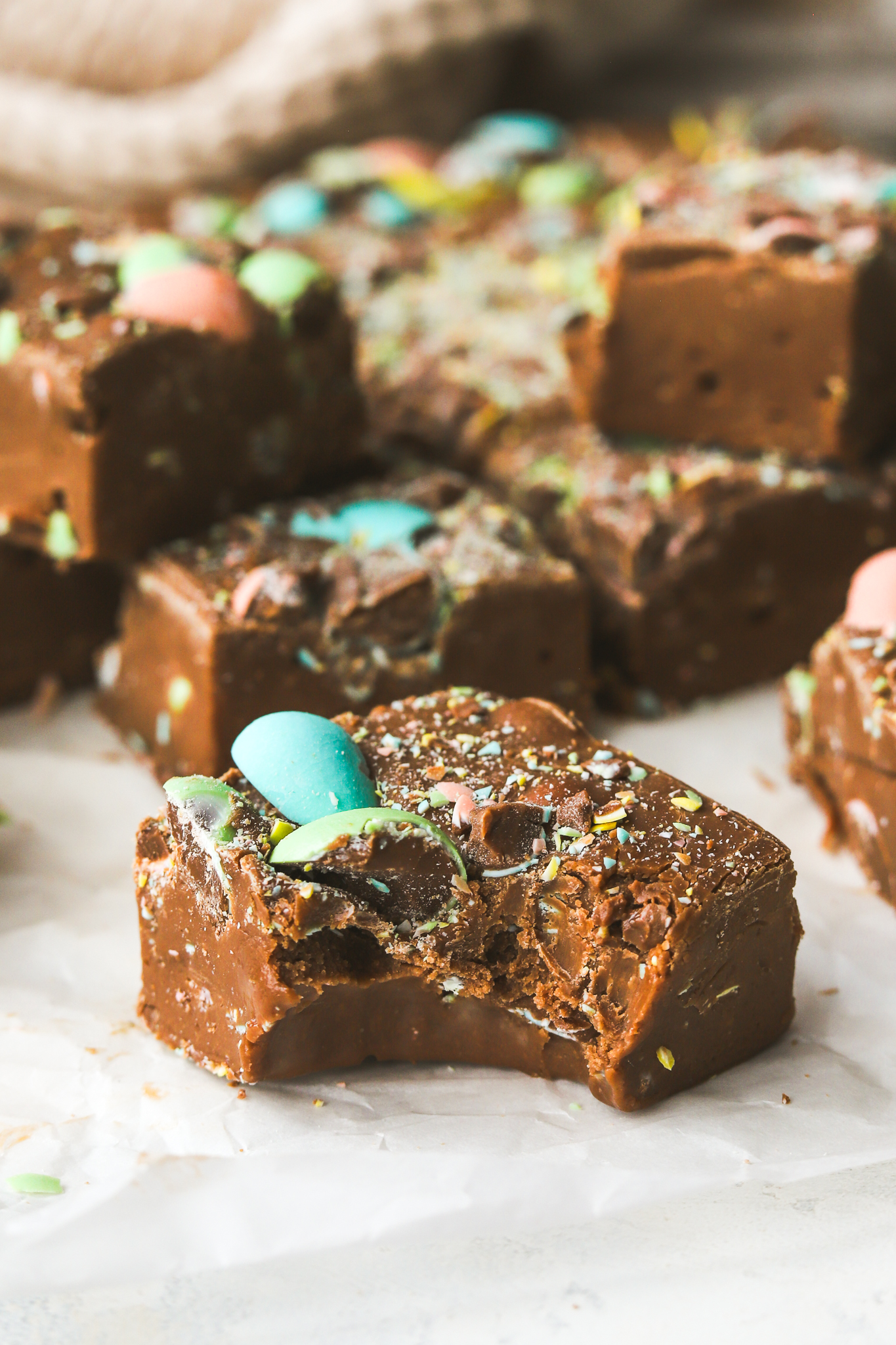 3 ingredient mini egg fudge with a bite taken out of