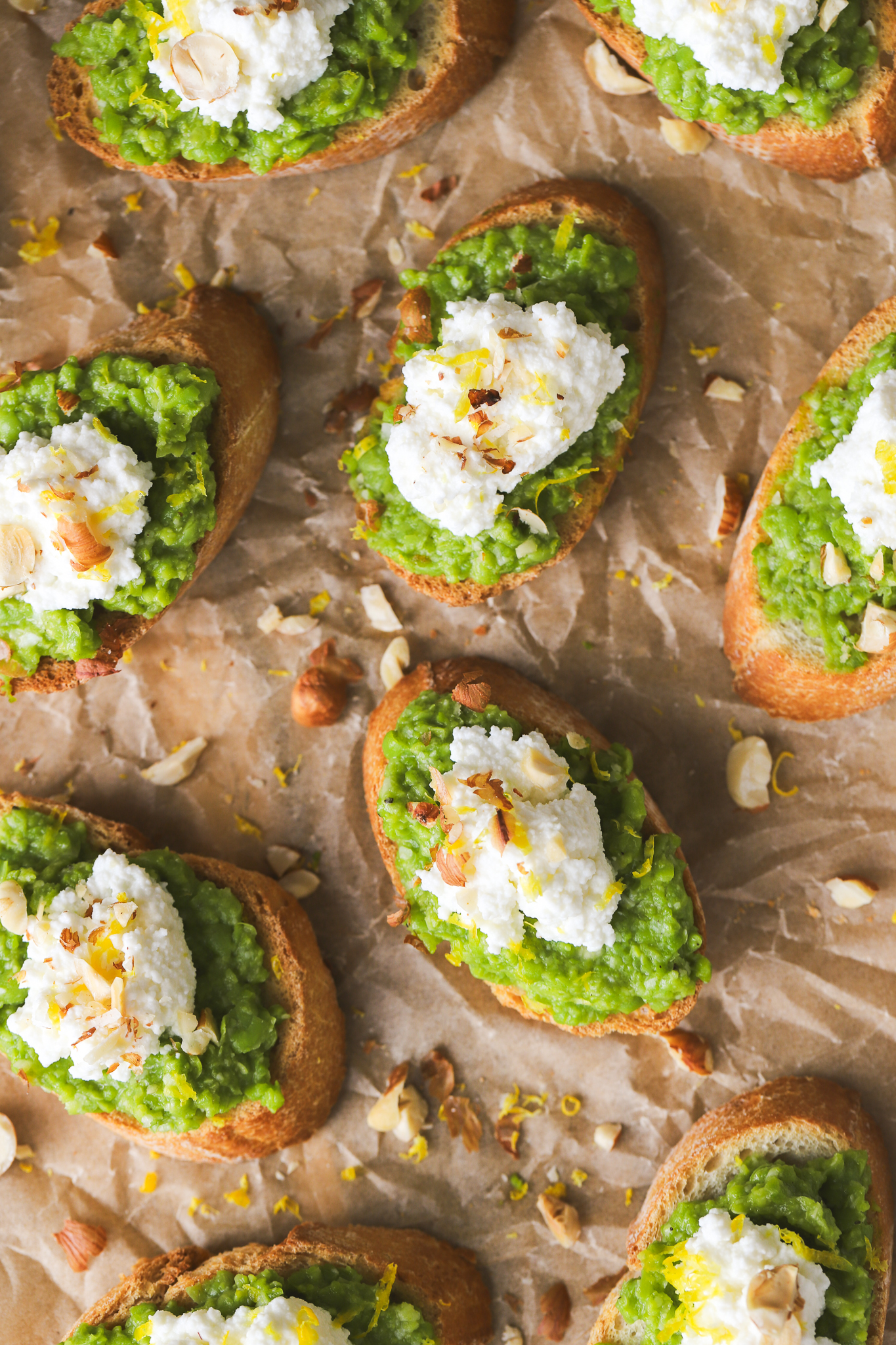 overhead photo of Spring pea crostini on a serving board