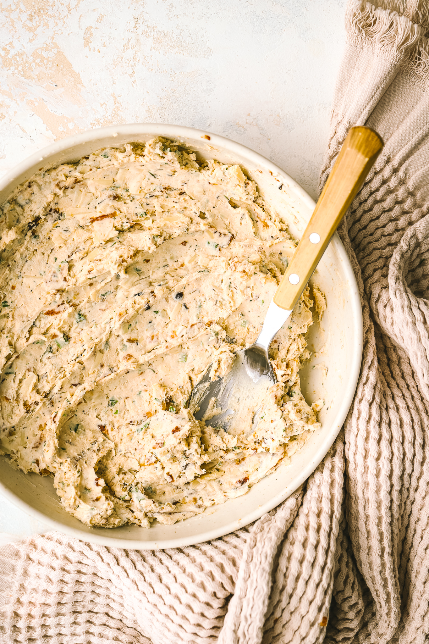 caramelized onion cheese ball mixture in a bowl