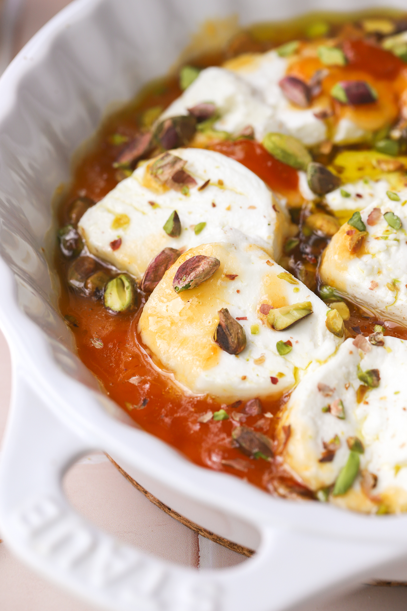 close up of baked goat cheese appetizer