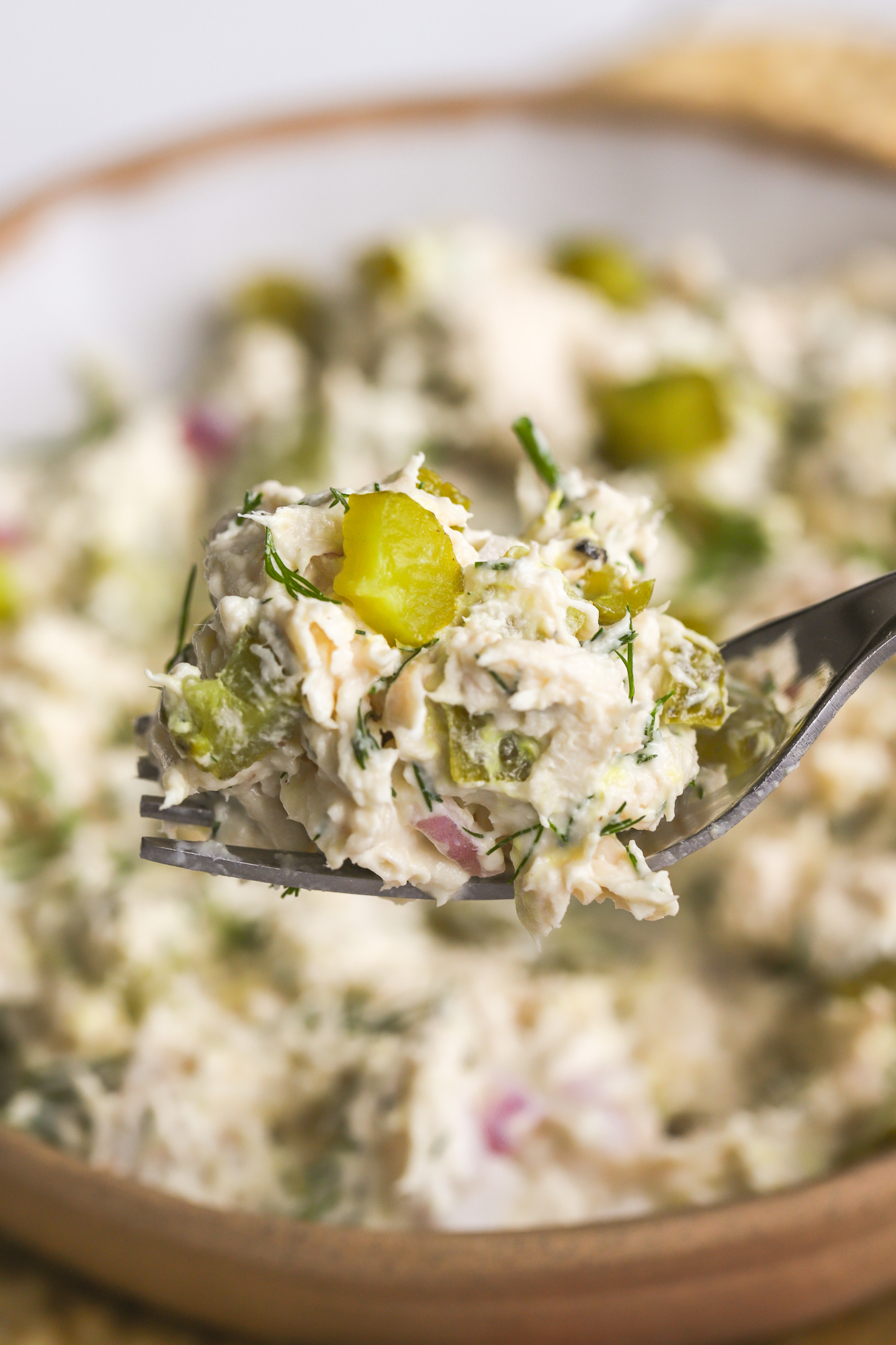 dill pickle chicken salad on a fork