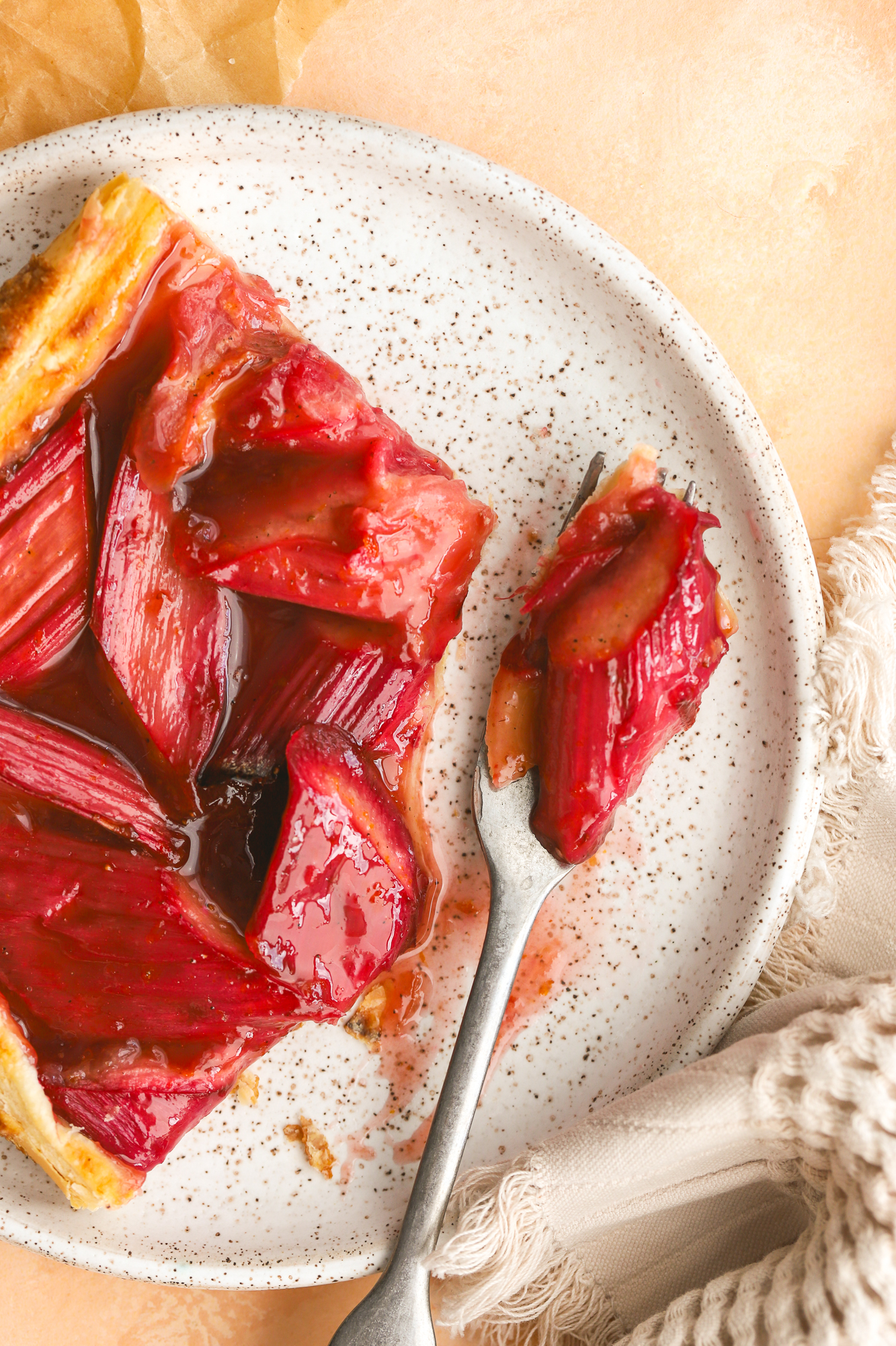 fork with a piece of rhubarb tart on it