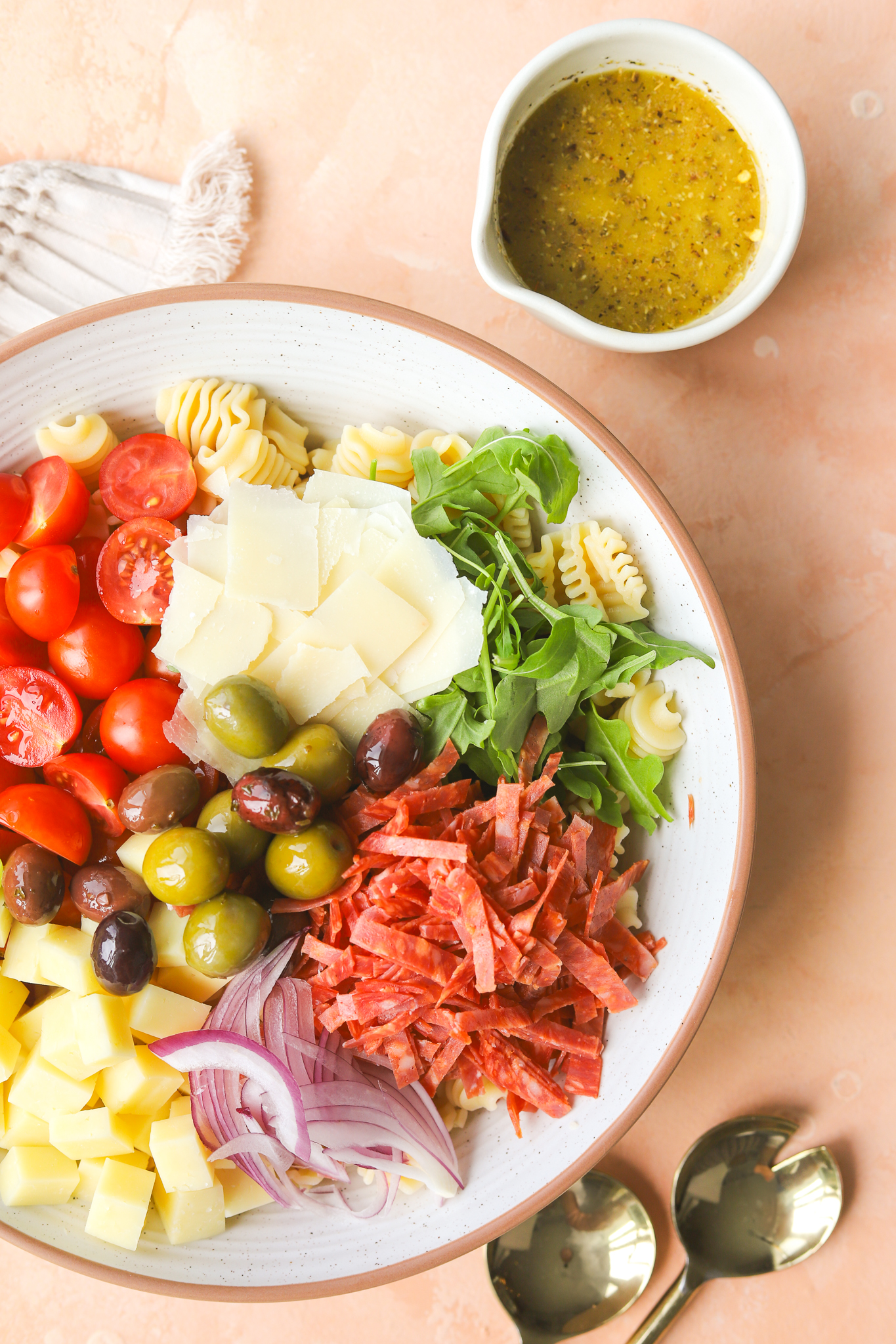 summer pasta salad ingredients in a bowl
