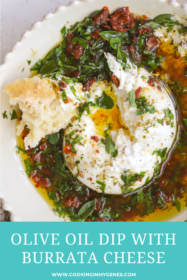 bread dipped into burrata and olive oil with herbs