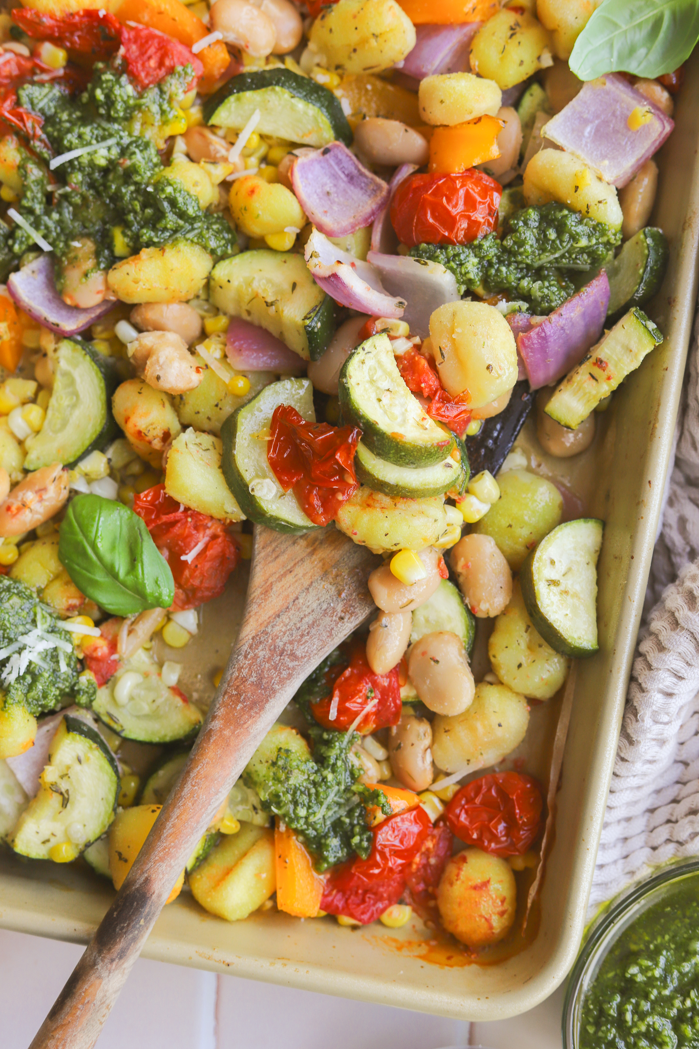 serving spoon in sheet pan gnocchi