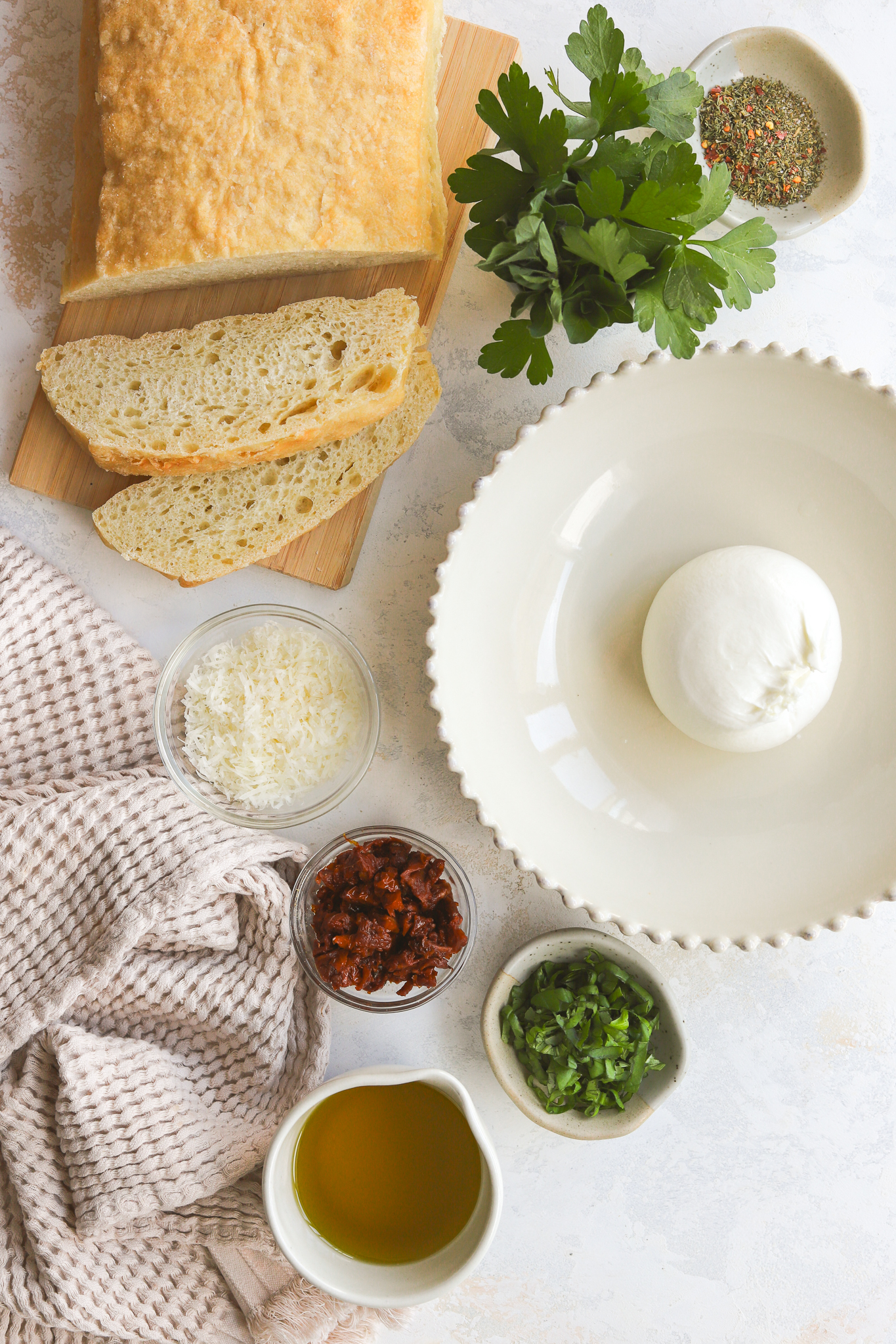 ingredients to make olive oil dip in bowls