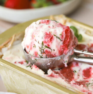 strawberry basil ice cream in an ice cream scoop