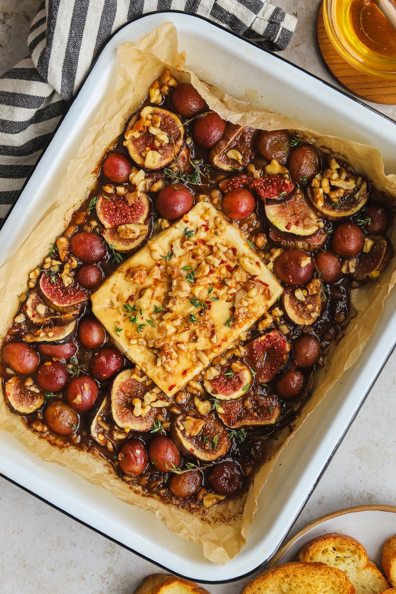 baked feta with figs in a baking dish