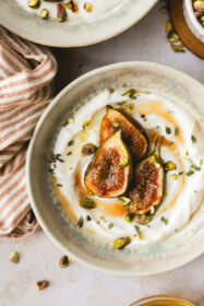 honey roasted figs in a bowl with yogurt