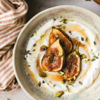 honey roasted figs in a bowl with yogurt