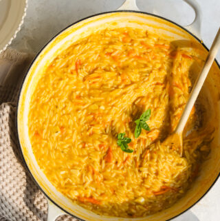 sungold tomato orzo pasta in a braiser