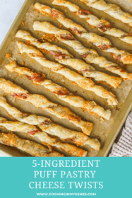 baked puff pastry cheese twists on a baking sheet