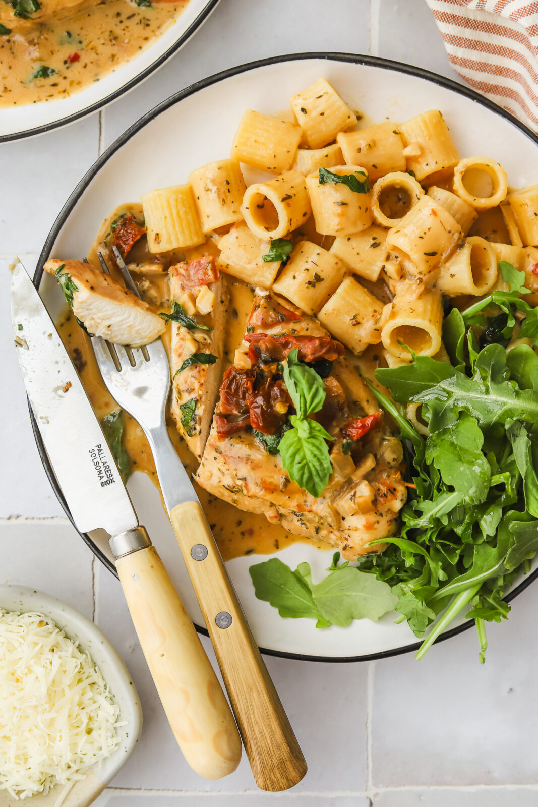 fork with a piece of marry me chicken