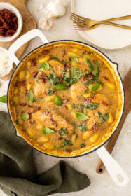 one pan with cooked chicken and gnocchi in a sundried tomato sauce