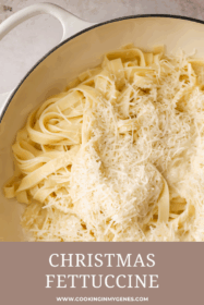 close up of freshly grated parmesan cheese on fettuccine noodles