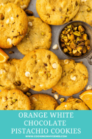 orange white chocolate pistachio cookies on a baking tray