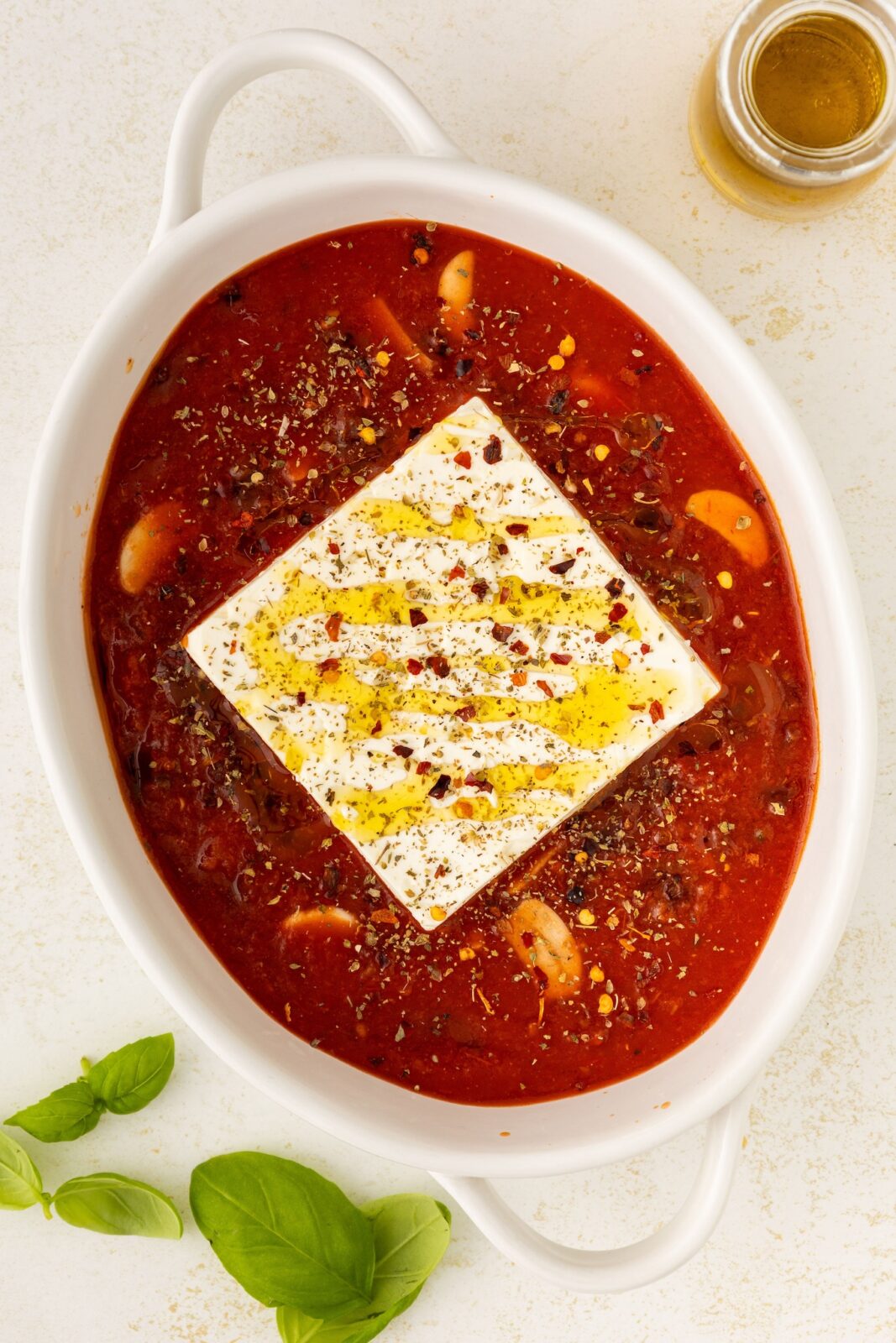 one piece of feta in marinara sauce