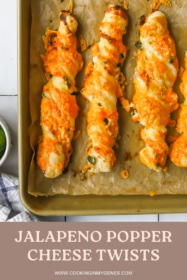 baked jalapeno popper cheese twists on a baking sheet