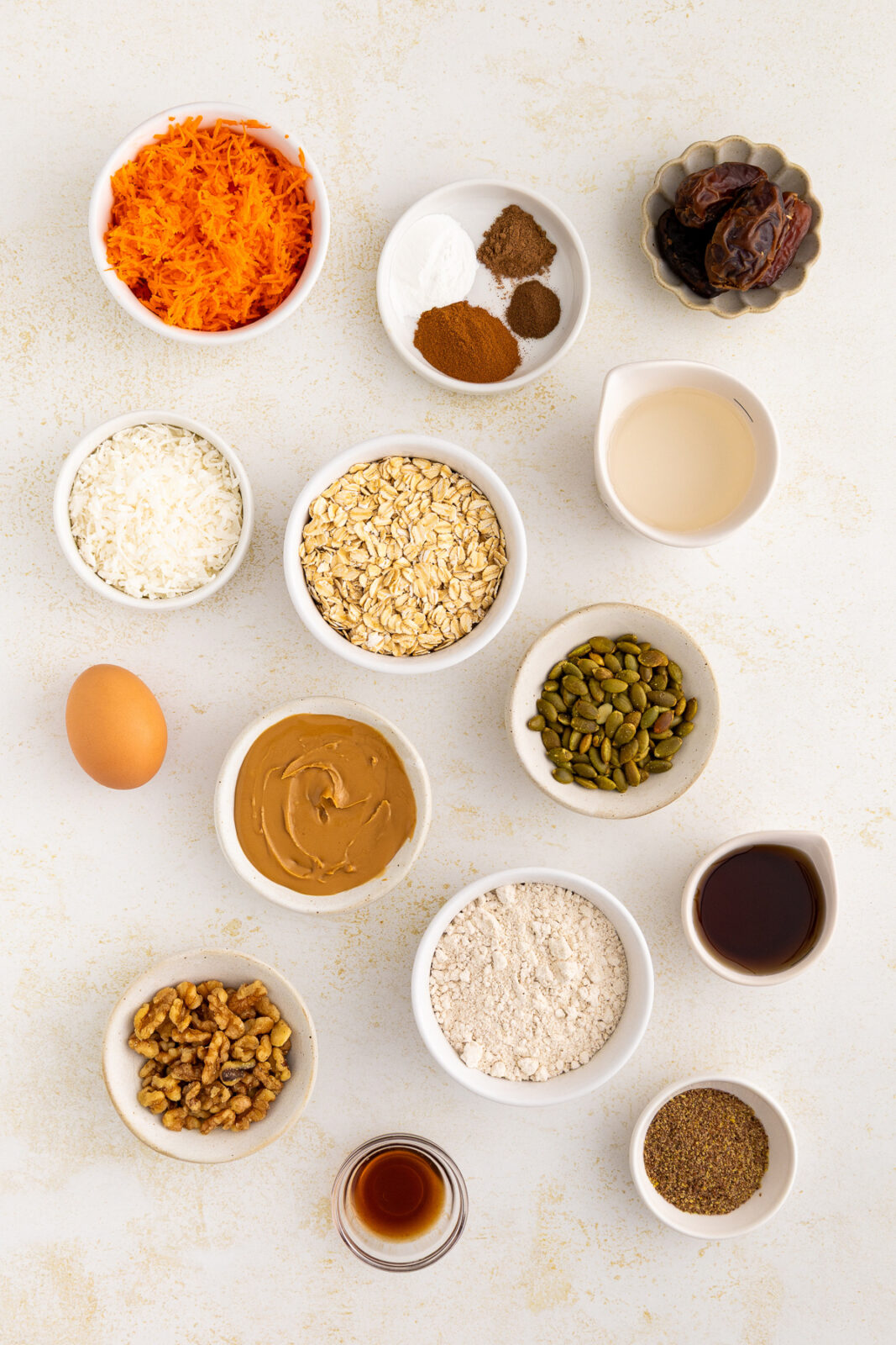 carrot cake cookie ingredients in bowls