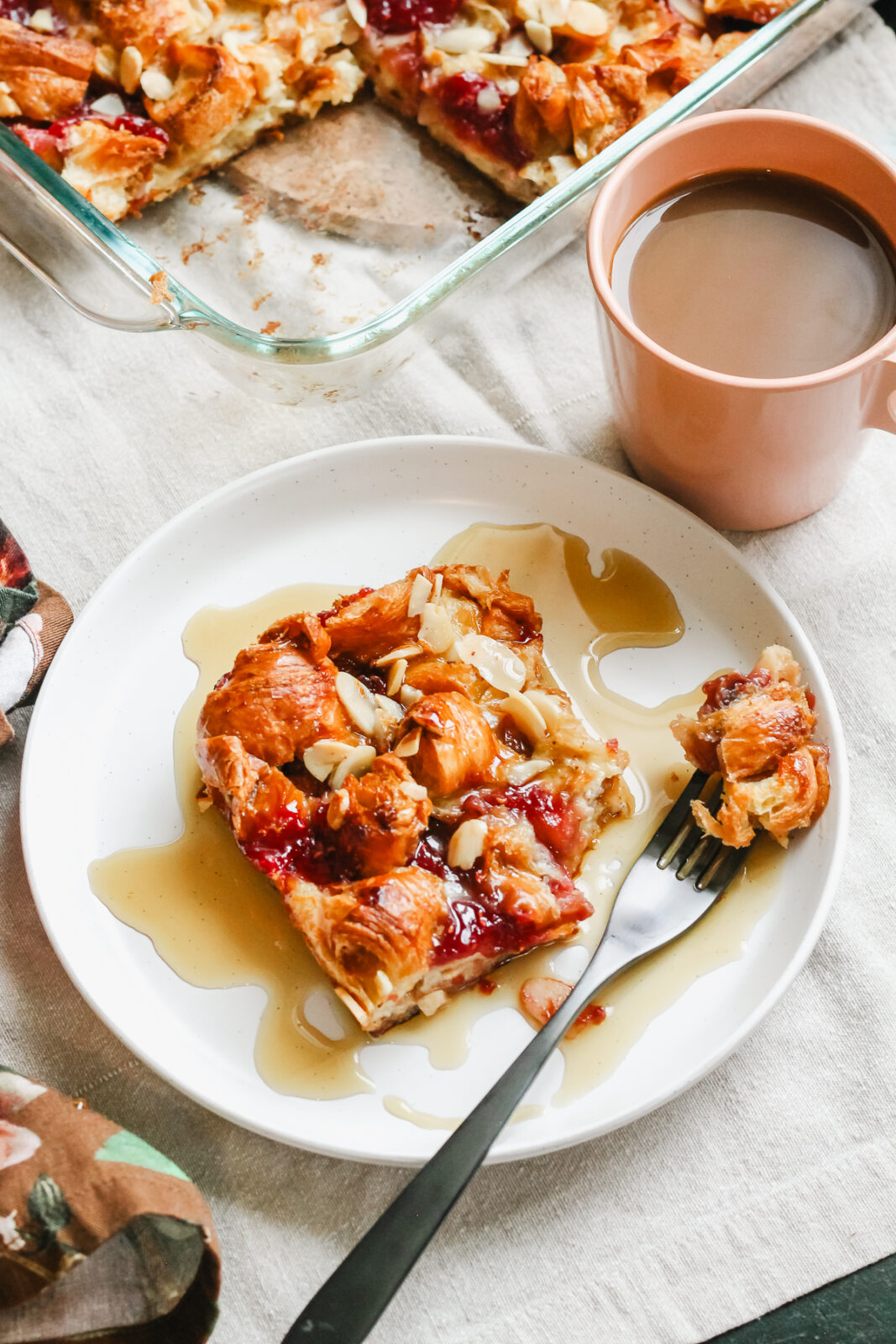 piece of french toast bake on a fork on a plate
