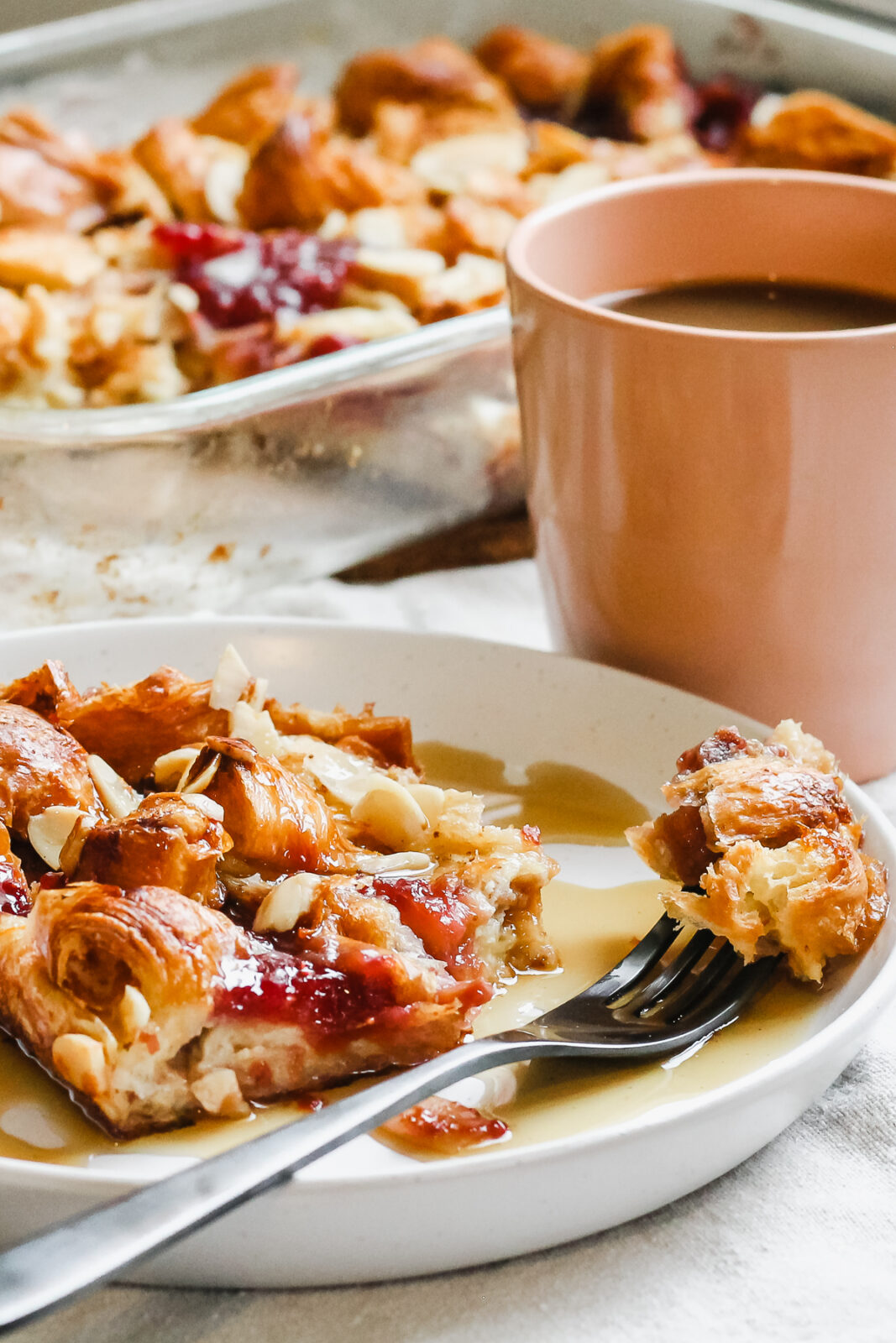 close up of piece of french toast bake on a fork